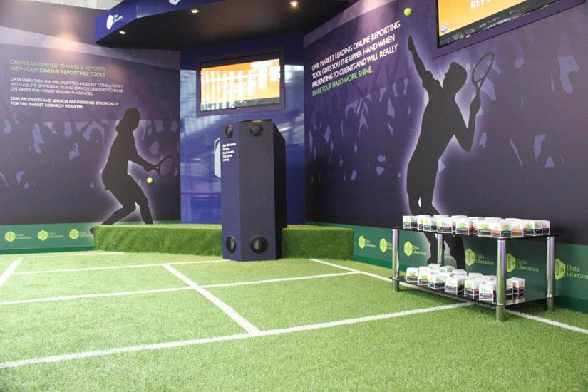 An indoor sports area with artificial grass